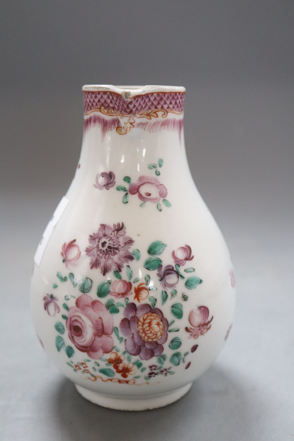 A Chinese export famille rose jug, height 14cm